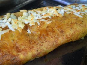 Снимка 3 от рецепта за Картофено руло с плънка от сирене и варени яйца