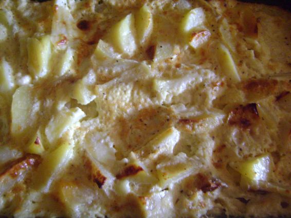 Снимка 2 от рецепта за Запечени картофи с яйца и сирене
